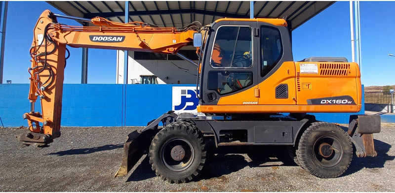 Doosan DX140W-3 *coming soon* - Колёсный экскаватор: фото 1 Doosan DX140W-3 *coming soon* - Колёсный экскаватор: фото 1