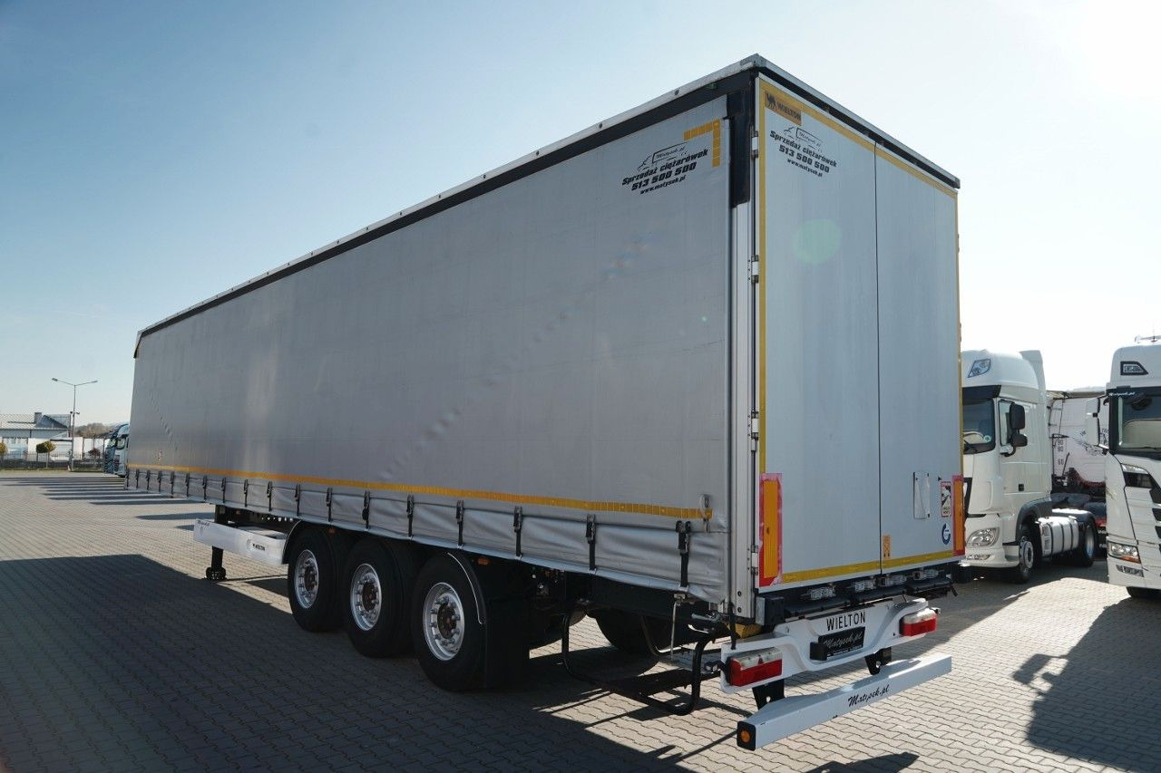 Wielton FIRANKA / STANDARD / OŚ PODNOSZONA / DACH PODNO - Тентованный полуприцеп: фото 5 Wielton FIRANKA / STANDARD / OŚ PODNOSZONA / DACH PODNO - Тентованный полуприцеп: фото 5