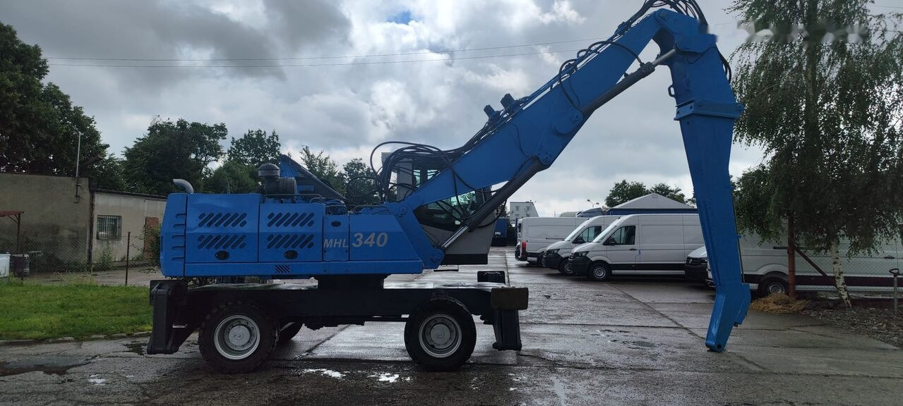 Перегружатель Fuchs MHL 340 D FQC magnet generator: фото 6 Перегружатель Fuchs MHL 340 D FQC magnet generator: фото 6