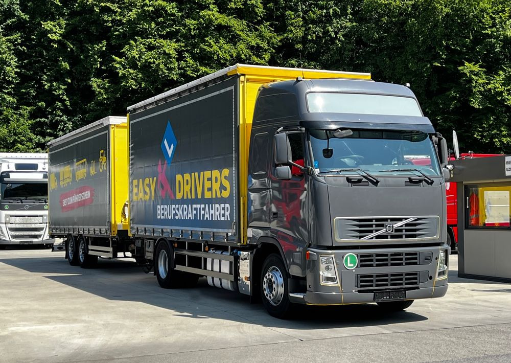 Volvo FH 420 4x2 // Zestaw + przyczepa Schwarzmuller // Jak Nowy // Niski przebieg // Automat // Idealny !!! - Тентованный грузовик: фото 1 Volvo FH 420 4x2 // Zestaw + przyczepa Schwarzmuller // Jak Nowy // Niski przebieg // Automat // Idealny !!! - Тентованный грузовик: фото 1