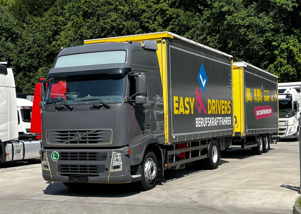 Volvo FH 420 4x2 // Zestaw + przyczepa Schwarzmuller // Jak Nowy // Niski przebieg // Automat // Idealny !!! - Тентованный грузовик: фото 3 Volvo FH 420 4x2 // Zestaw + przyczepa Schwarzmuller // Jak Nowy // Niski przebieg // Automat // Idealny !!! - Тентованный грузовик: фото 3