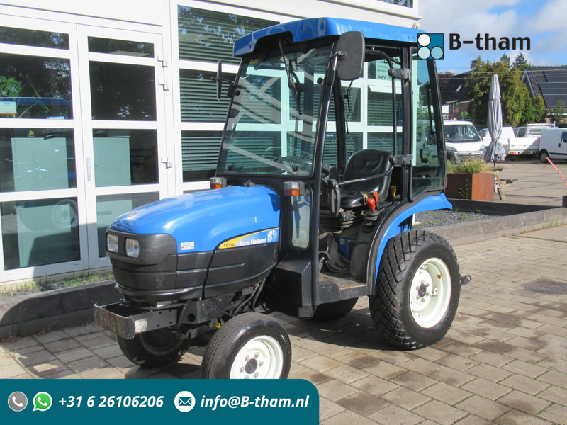 New Holland TC21D 4WD 4x4 Cabine Verwarming - Трактор: фото 1 New Holland TC21D 4WD 4x4 Cabine Verwarming - Трактор: фото 1