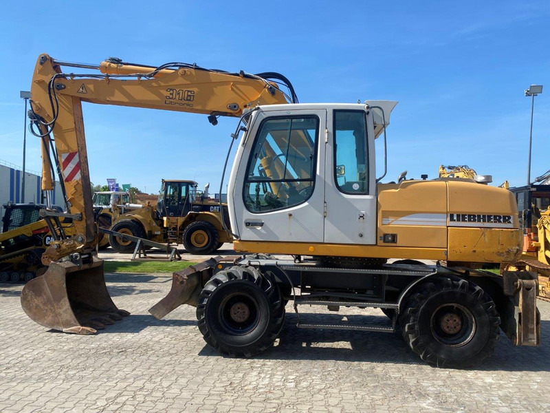 Liebherr A316 Litronic NVT - Колёсный экскаватор: фото 2 Liebherr A316 Litronic NVT - Колёсный экскаватор: фото 2