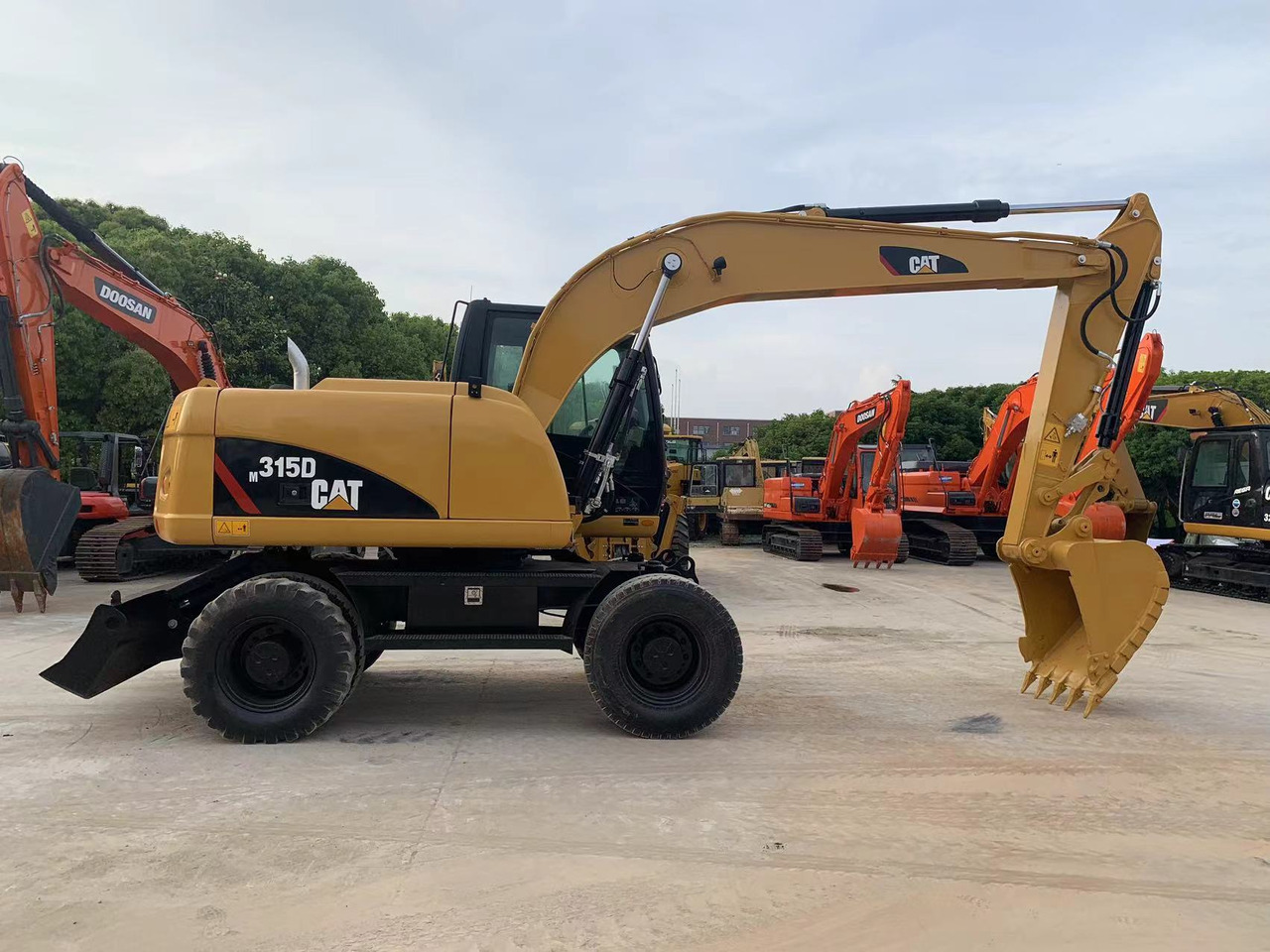 CATERPILLAR 315D - Колёсный экскаватор: фото 1 CATERPILLAR 315D - Колёсный экскаватор: фото 1