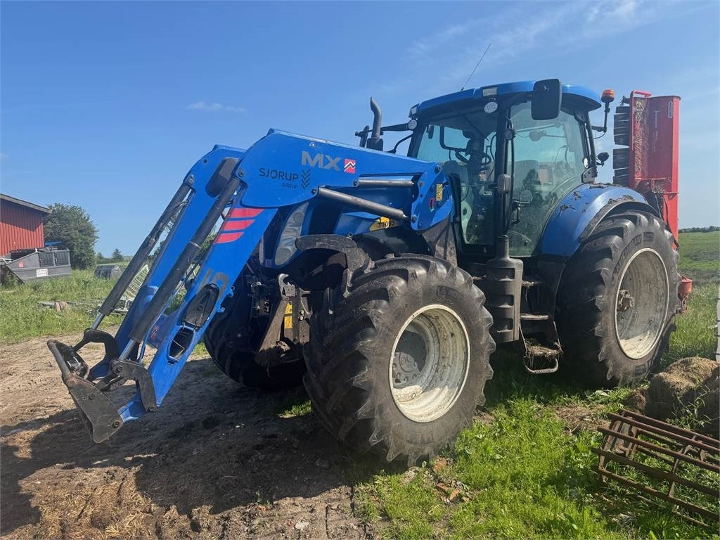 New Holland T7060TG - Трактор: фото 1 New Holland T7060TG - Трактор: фото 1