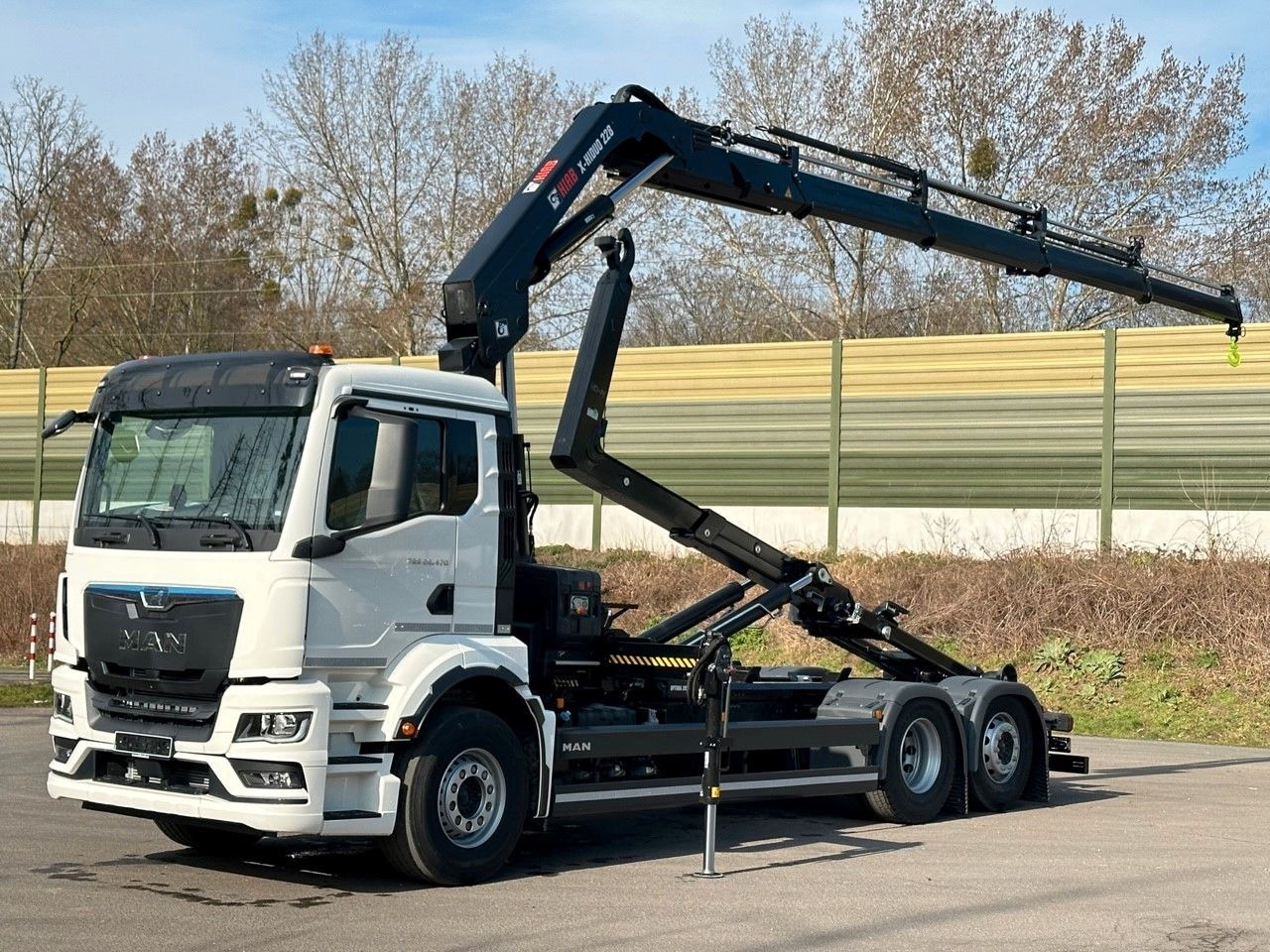 MAN TGS 26.470 6x2 Abrollkipper + Kran Hiab 228-4 - Крюковой мультилифт, Автоманипулятор: фото 1 MAN TGS 26.470 6x2 Abrollkipper + Kran Hiab 228-4 - Крюковой мультилифт, Автоманипулятор: фото 1