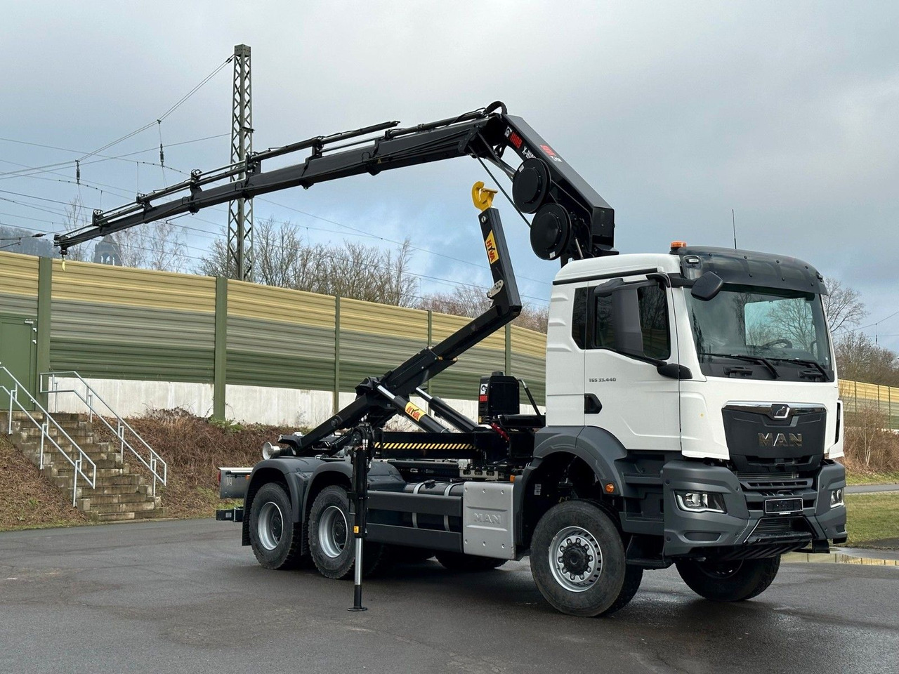 MAN TGS 33.440 6x6 BB Abrollkipper+Kran Hiab 228-6 - Крюковой мультилифт, Автоманипулятор: фото 3 MAN TGS 33.440 6x6 BB Abrollkipper+Kran Hiab 228-6 - Крюковой мультилифт, Автоманипулятор: фото 3