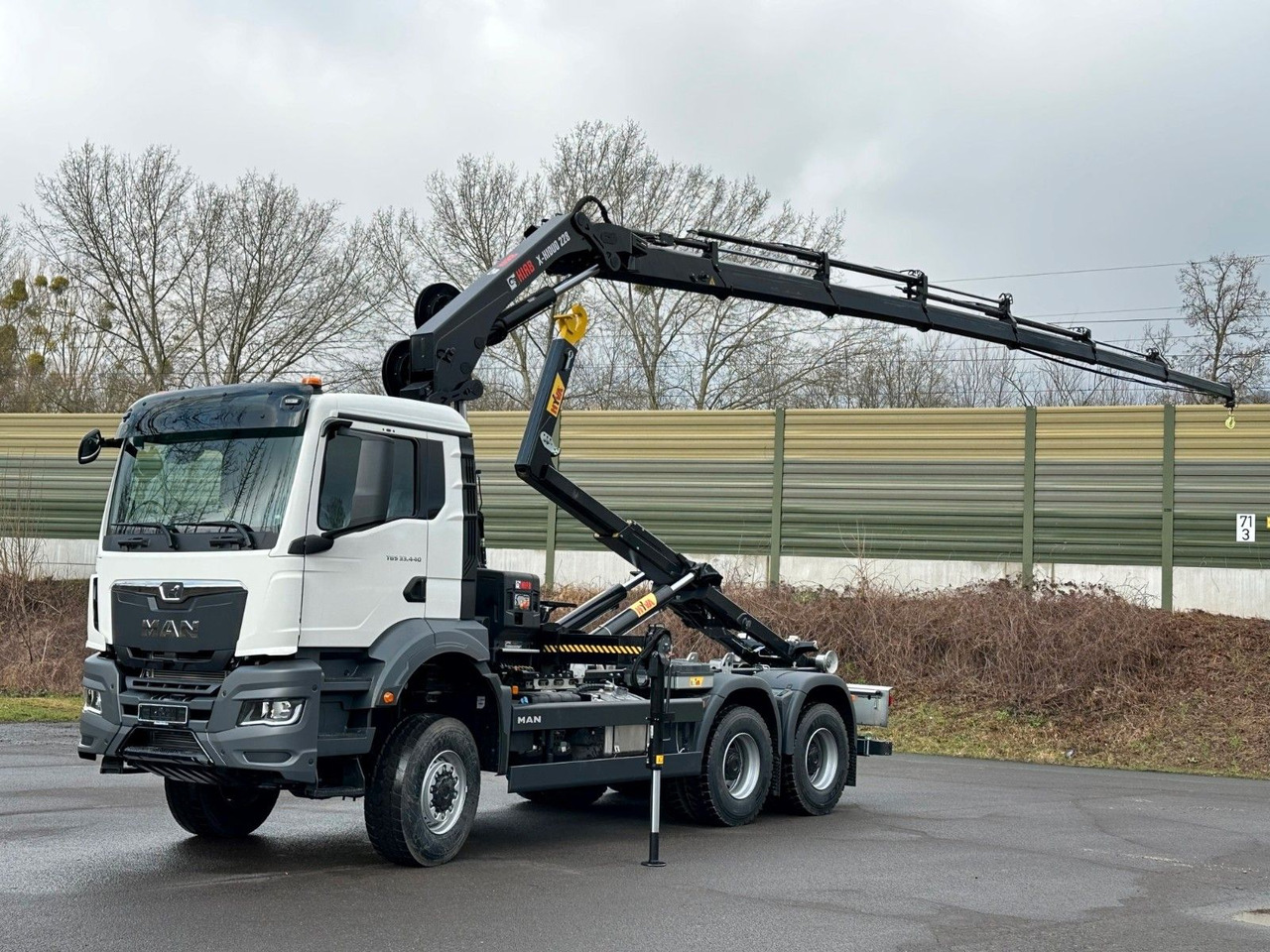 MAN TGS 33.440 6x6 BB Abrollkipper+Kran Hiab 228-6 - Крюковой мультилифт, Автоманипулятор: фото 1 MAN TGS 33.440 6x6 BB Abrollkipper+Kran Hiab 228-6 - Крюковой мультилифт, Автоманипулятор: фото 1