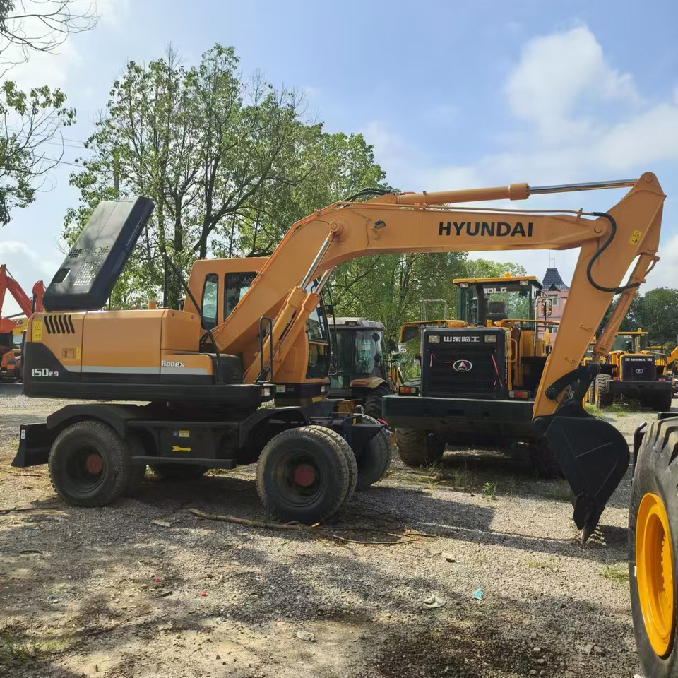 Hyundai R150LC-9 - Колёсный экскаватор: фото 1 Hyundai R150LC-9 - Колёсный экскаватор: фото 1