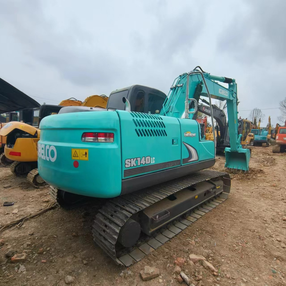 KOBELCO SK140 - Гусеничный экскаватор: фото 2 KOBELCO SK140 - Гусеничный экскаватор: фото 2