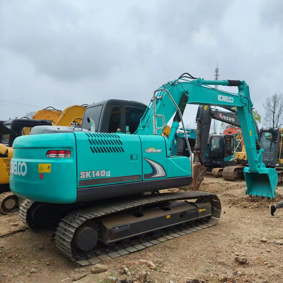 KOBELCO SK140 - Гусеничный экскаватор: фото 1 KOBELCO SK140 - Гусеничный экскаватор: фото 1