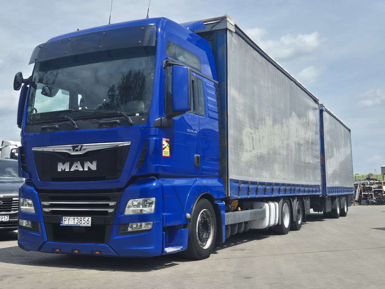 MAN tgx 24,500 - Тентованный грузовик: фото 1 MAN tgx 24,500 - Тентованный грузовик: фото 1