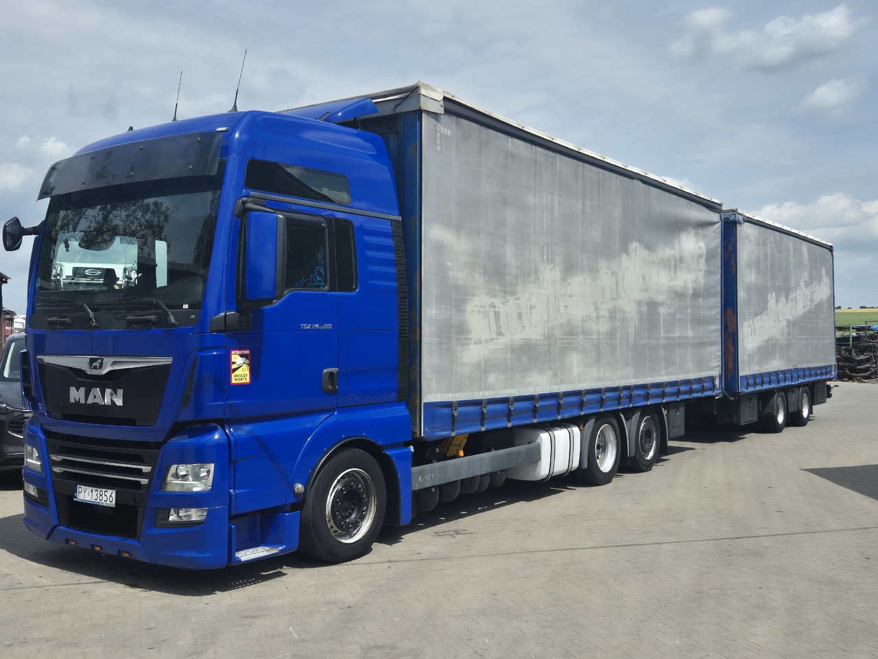 MAN tgx 24,500 - Тентованный грузовик: фото 2 MAN tgx 24,500 - Тентованный грузовик: фото 2
