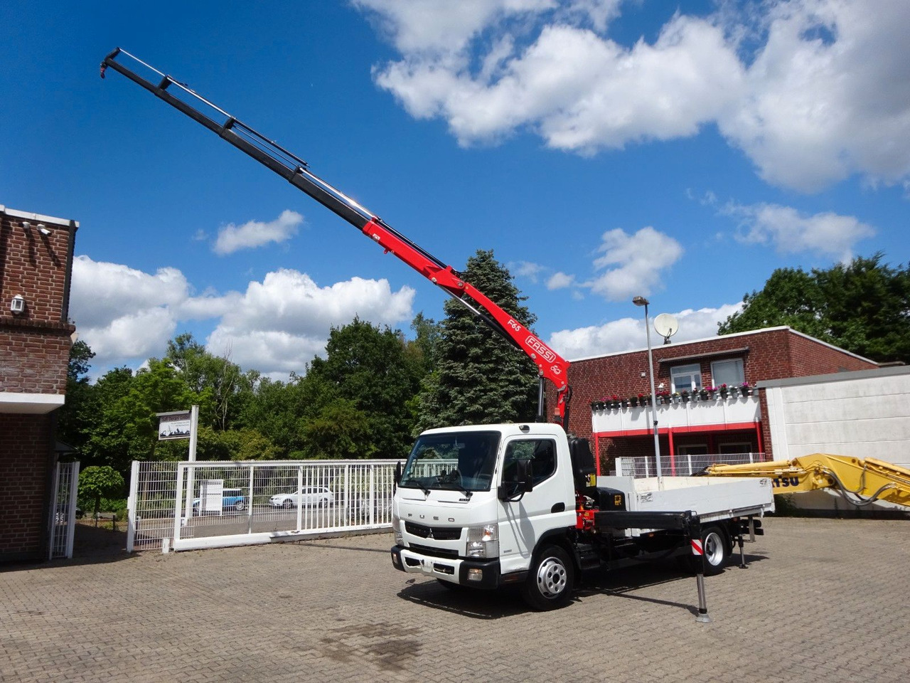 FUSO Canter 7C15 mit FASSI F65A Kran - Малотоннажный бортовой грузовик: фото 1 FUSO Canter 7C15 mit FASSI F65A Kran - Малотоннажный бортовой грузовик: фото 1