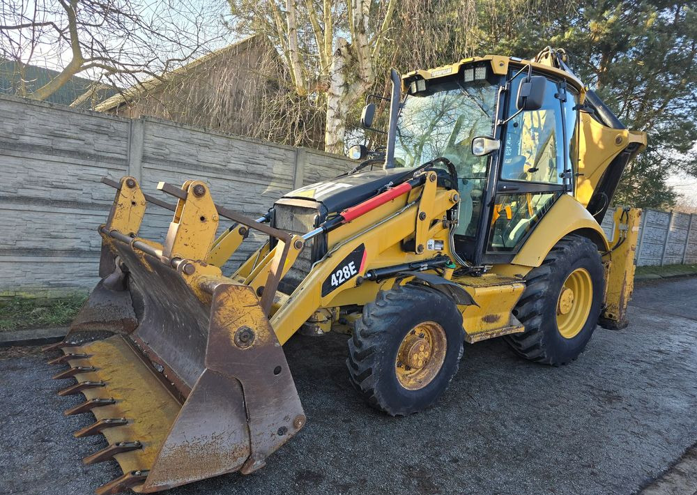 Caterpillar - Экскаватор-погрузчик: фото 1 Caterpillar - Экскаватор-погрузчик: фото 1