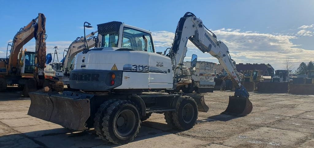 Liebherr A 309 Litronic - Колёсный экскаватор: фото 3 Liebherr A 309 Litronic - Колёсный экскаватор: фото 3
