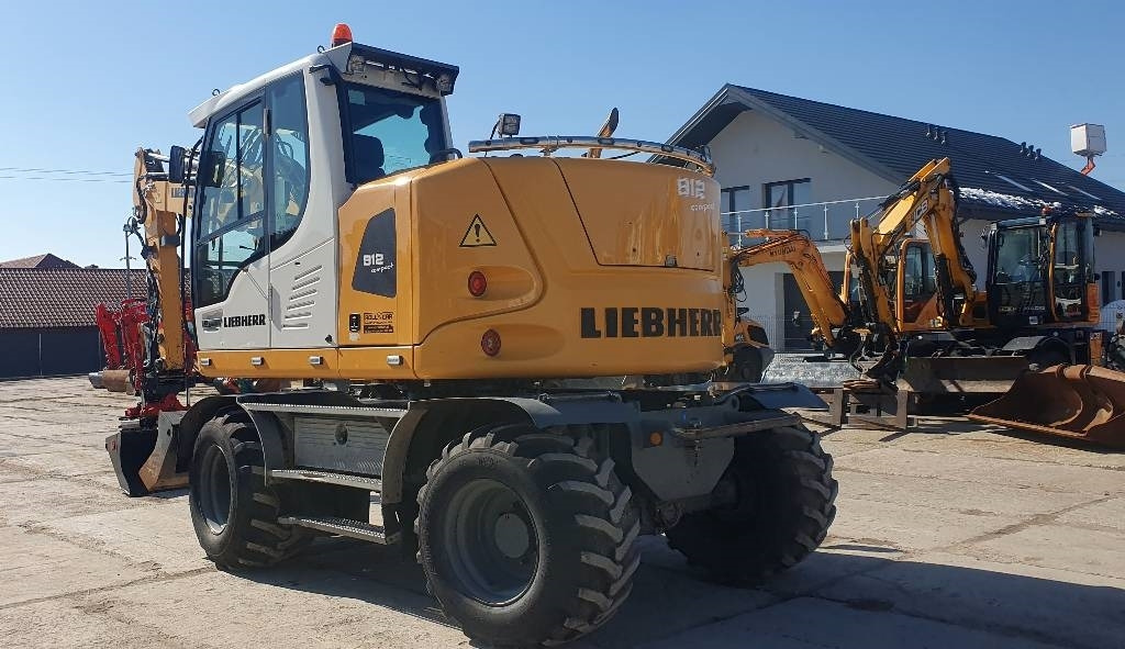 Liebherr A 912 compact - Колёсный экскаватор: фото 2 Liebherr A 912 compact - Колёсный экскаватор: фото 2