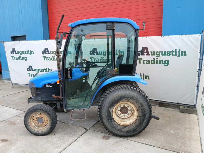 New Holland TC 27 - Трактор: фото 1 New Holland TC 27 - Трактор: фото 1