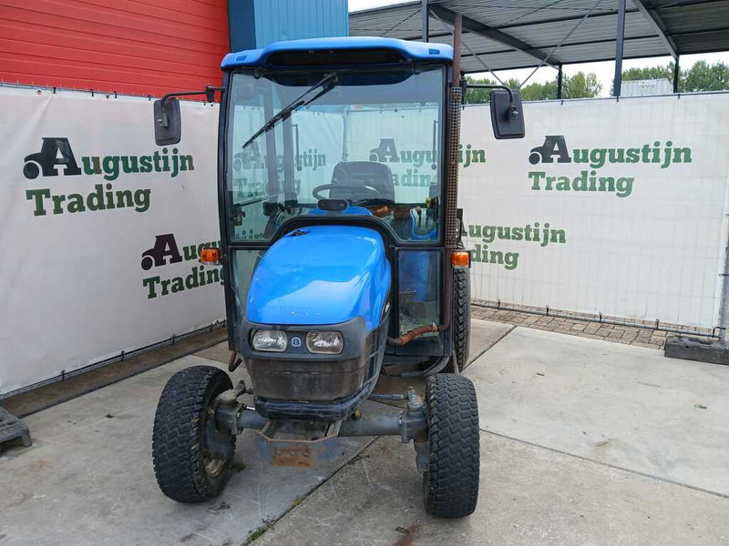 New Holland TC 27 - Трактор: фото 2 New Holland TC 27 - Трактор: фото 2