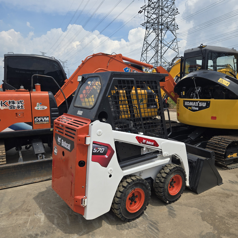 BOBCAT S70 - Мини-погрузчик с бортовым поворотом: фото 1 BOBCAT S70 - Мини-погрузчик с бортовым поворотом: фото 1