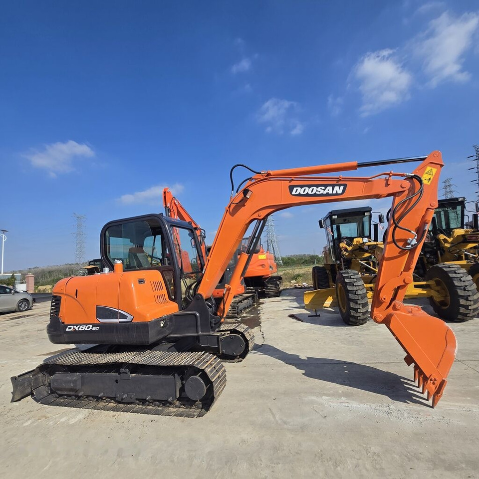 Doosan DX60 - Мини-экскаватор: фото 1 Doosan DX60 - Мини-экскаватор: фото 1