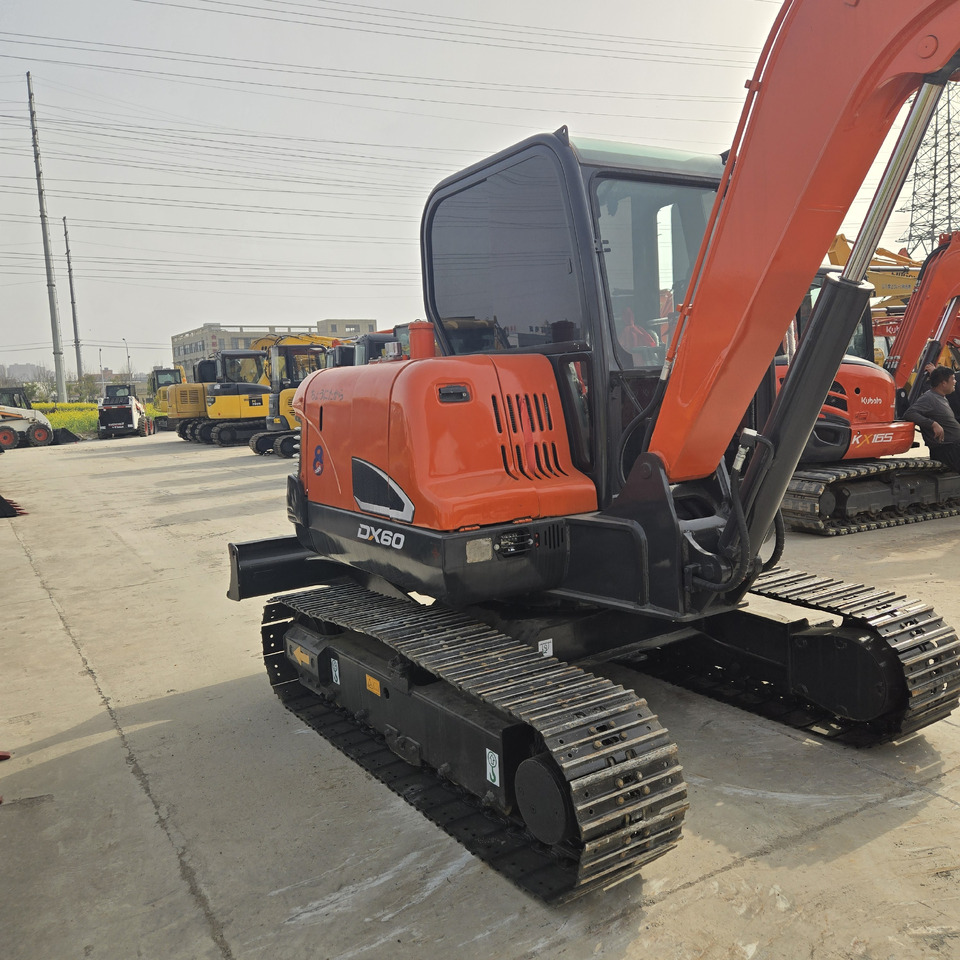 Doosan DX60 - Гусеничный экскаватор: фото 5 Doosan DX60 - Гусеничный экскаватор: фото 5