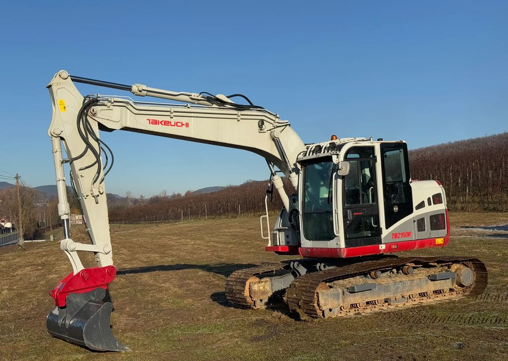 Takeuchi KOPARKA TAKEUCHI TB2150R 5100 MTH SPROWADZONA STAN PERFEKCYJNY - Гусеничный экскаватор: фото 1 Takeuchi KOPARKA TAKEUCHI TB2150R 5100 MTH SPROWADZONA STAN PERFEKCYJNY - Гусеничный экскаватор: фото 1