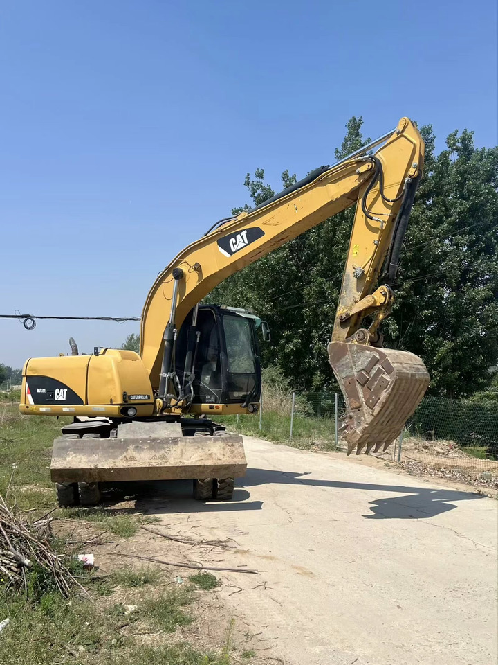 CATERPILLAR M317D2 - Колёсный экскаватор: фото 5 CATERPILLAR M317D2 - Колёсный экскаватор: фото 5