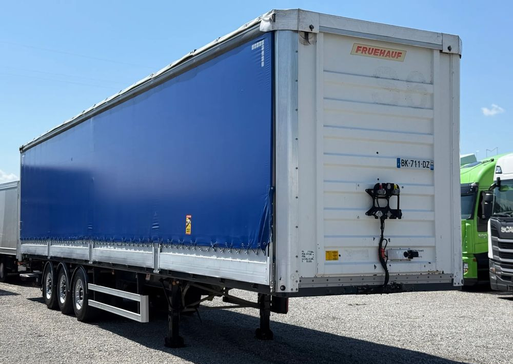 Fruehauf OSIE SAF BURTO FIRANKA PODNOSZONA OŚ - Тентованный полуприцеп: фото 1 Fruehauf OSIE SAF BURTO FIRANKA PODNOSZONA OŚ - Тентованный полуприцеп: фото 1