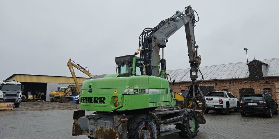 Koparka kołowa Liebherr A 316 Litronic chwytak podpory pług - Колёсный экскаватор: фото 5 Koparka kołowa Liebherr A 316 Litronic chwytak podpory pług - Колёсный экскаватор: фото 5