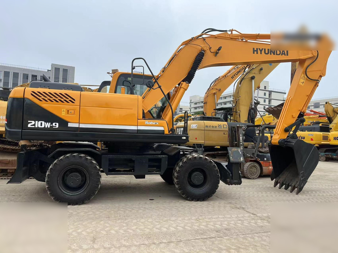 Колёсный экскаватор HYUNDAI ROBEX 210W-9: фото 1