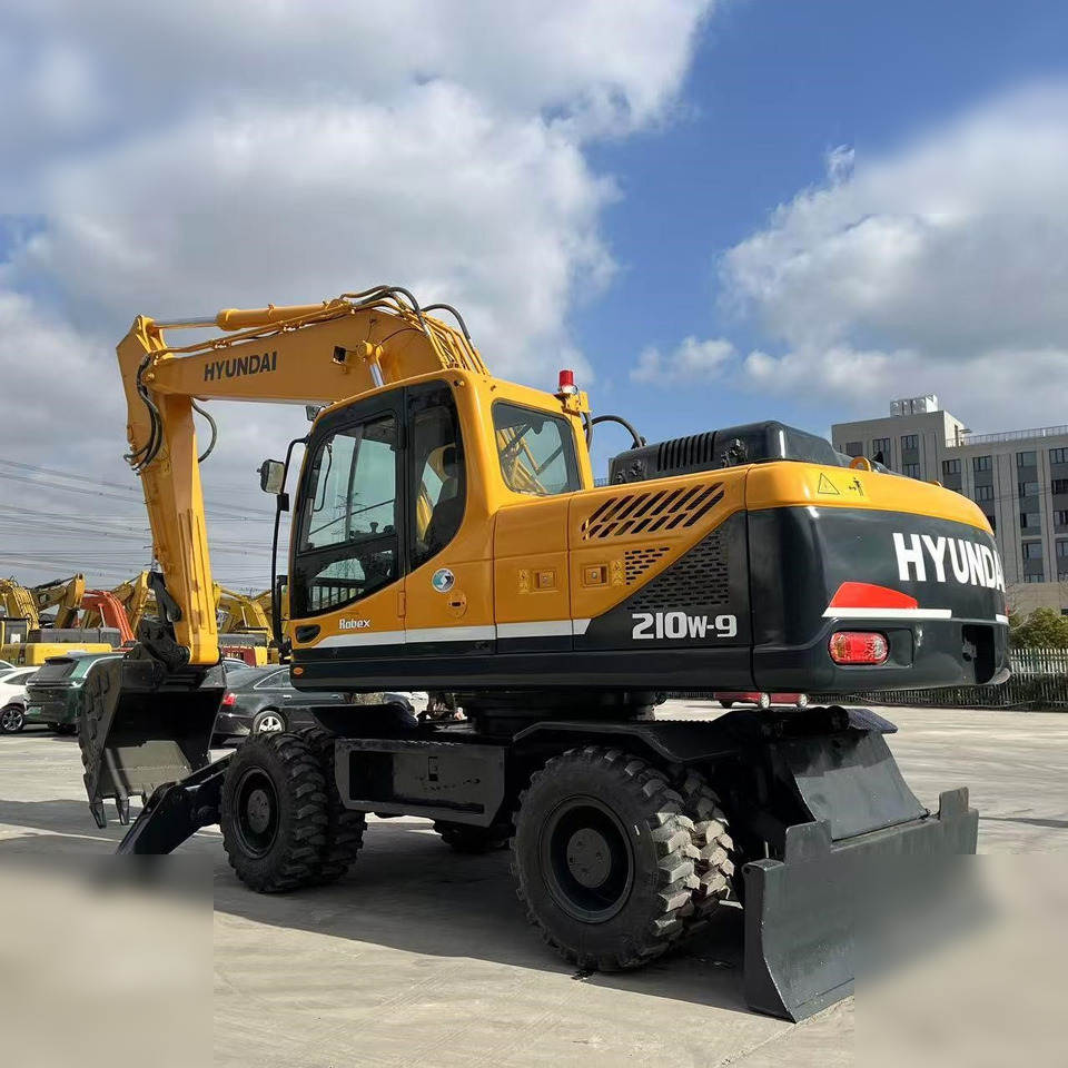 HYUNDAI ROBEX 210W-9 - Колёсный экскаватор: фото 1 HYUNDAI ROBEX 210W-9 - Колёсный экскаватор: фото 1