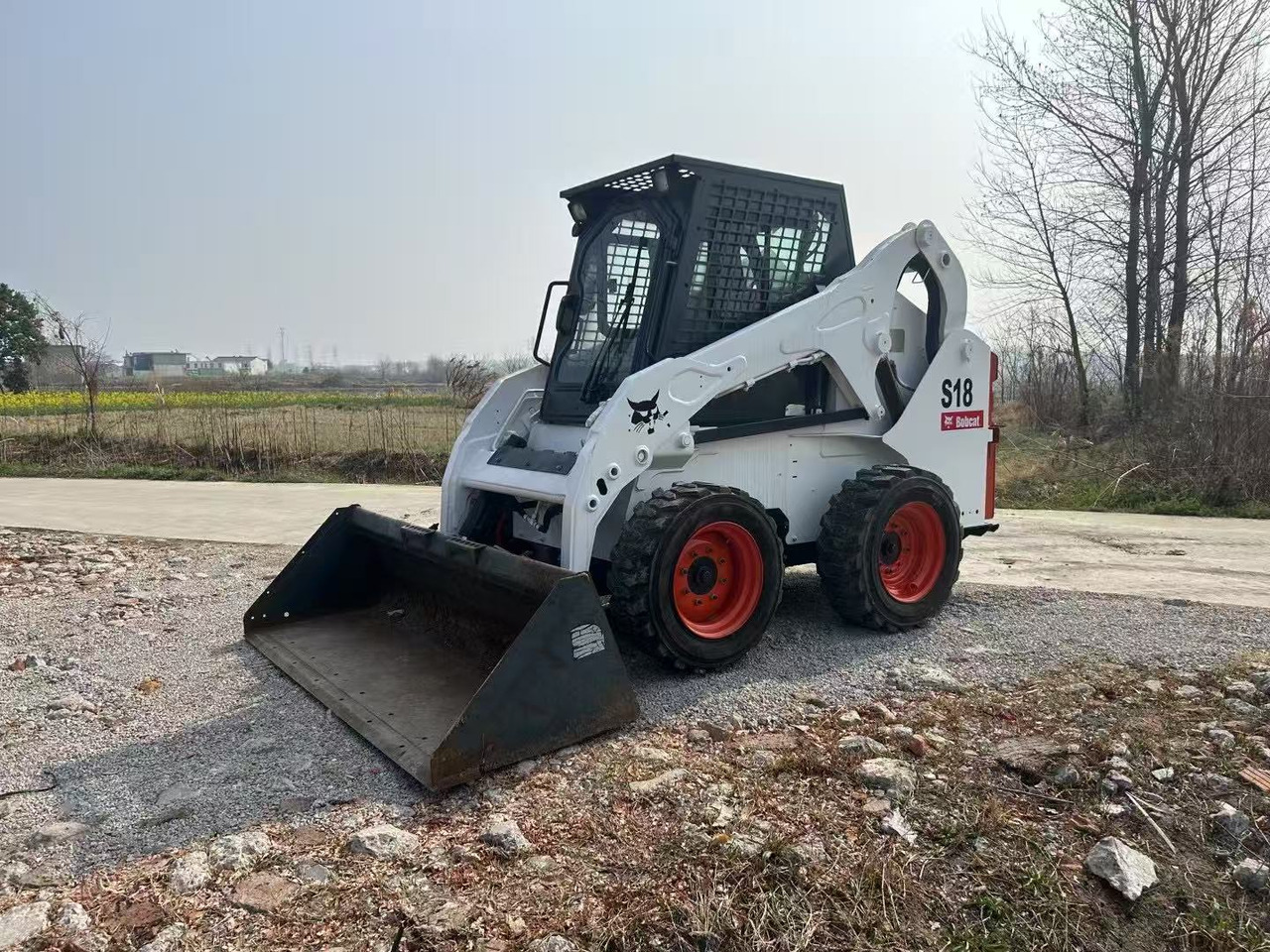 BOBCAT S18 - Мини-погрузчик с бортовым поворотом: фото 1 BOBCAT S18 - Мини-погрузчик с бортовым поворотом: фото 1