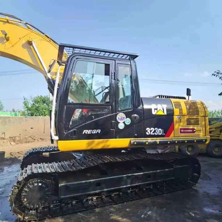 Used Digger CAT 323DL Construction Machinery Construction Digger Used CAT 323DL Cheap Excavator - Гусеничный экскаватор: фото 1 Used Digger CAT 323DL Construction Machinery Construction Digger Used CAT 323DL Cheap Excavator - Гусеничный экскаватор: фото 1