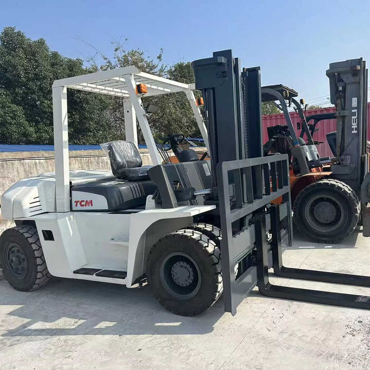 High Quality TCM 7 Ton with Hydraulic Distance Adjustment Used Forklift in Stock Used tcm Forklift 7 Ton Used tcm Fd70 Forklift - Вилочный погрузчик: фото 1 High Quality TCM 7 Ton with Hydraulic Distance Adjustment Used Forklift in Stock Used tcm Forklift 7 Ton Used tcm Fd70 Forklift - Вилочный погрузчик: фото 1