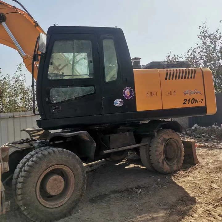 Yellow Color Hyundai210w-7 Used Wheel Excavator Used Hyundai210-7 on Sale with Cheap Price - Гусеничный экскаватор: фото 1 Yellow Color Hyundai210w-7 Used Wheel Excavator Used Hyundai210-7 on Sale with Cheap Price - Гусеничный экскаватор: фото 1