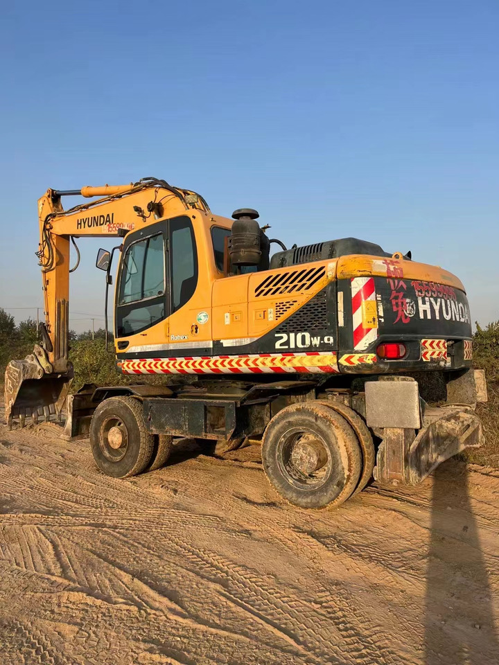 HYUNDAI R210W-9 - Колёсный экскаватор: фото 2 HYUNDAI R210W-9 - Колёсный экскаватор: фото 2