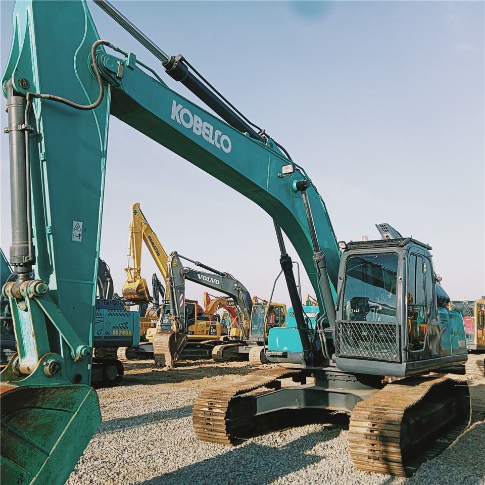 KOBELCO SK210 - Гусеничный экскаватор: фото 5 KOBELCO SK210 - Гусеничный экскаватор: фото 5