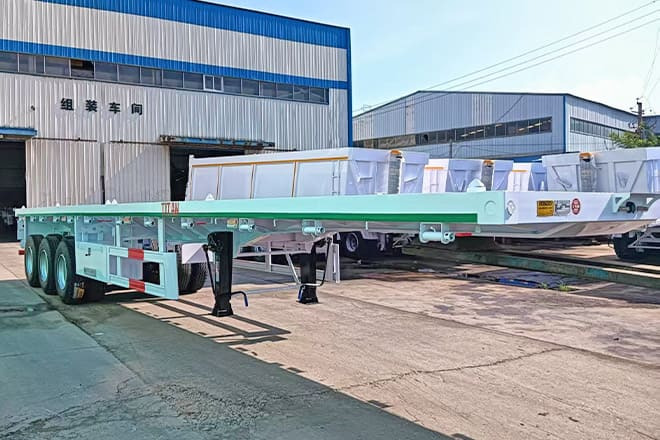 TITAN 3 Axle 40 Ft Flatbed Trailer for Sale in Mauritania - Полуприцеп-контейнеровоз/ Сменный кузов: фото 4 TITAN 3 Axle 40 Ft Flatbed Trailer for Sale in Mauritania - Полуприцеп-контейнеровоз/ Сменный кузов: фото 4