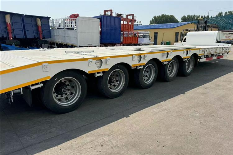 TITAN 5 Axle 100 Ton Low Bed Trailer for Sale In Tanzania - Низкорамный полуприцеп: фото 3 TITAN 5 Axle 100 Ton Low Bed Trailer for Sale In Tanzania - Низкорамный полуприцеп: фото 3