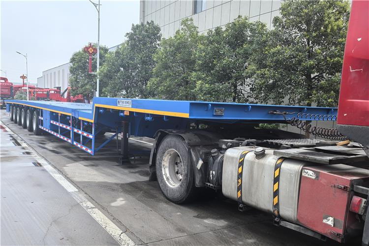 TITAN 6 Axle 54m Telescopic Flatbed Trailer for Sale In Angola - Полуприцеп бортовой/ Платформа: фото 3 TITAN 6 Axle 54m Telescopic Flatbed Trailer for Sale In Angola - Полуприцеп бортовой/ Платформа: фото 3