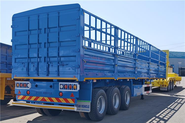 TITAN 60 Ton Fence Cargo Semi Trailer for Sale in Tanzania - Полуприцеп для перевозки животных: фото 1 TITAN 60 Ton Fence Cargo Semi Trailer for Sale in Tanzania - Полуприцеп для перевозки животных: фото 1