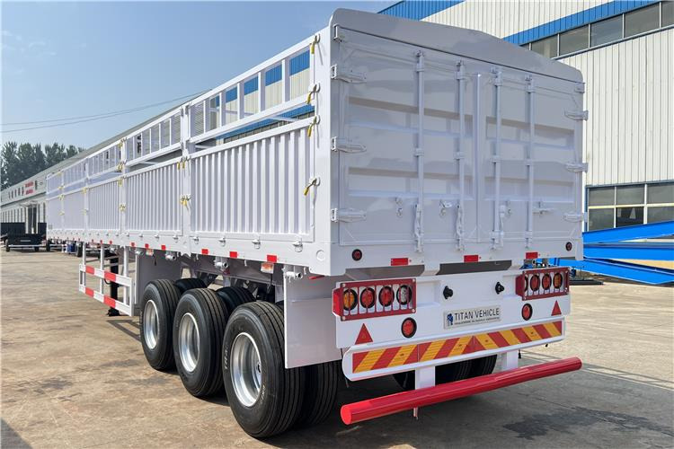TITAN Tri Axle 60 Ton Fence Cargo Semi Trailer for Sale In Guinea - Полуприцеп для перевозки животных: фото 5 TITAN Tri Axle 60 Ton Fence Cargo Semi Trailer for Sale In Guinea - Полуприцеп для перевозки животных: фото 5