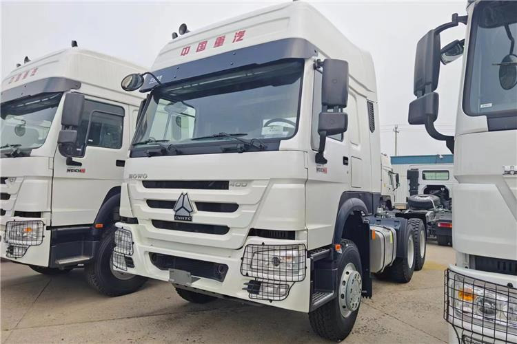 Sinotruk Used Howo Truck 400HP Tractor 6x4 Price for Sale In Tanzania - Тягач: фото 1 Sinotruk Used Howo Truck 400HP Tractor 6x4 Price for Sale In Tanzania - Тягач: фото 1