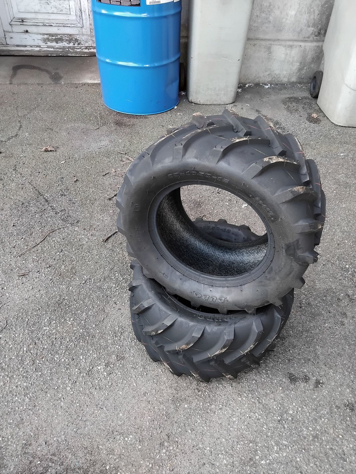 Lot de 2 pneus crantés 23x10 50-12 - Шина: фото 1 Lot de 2 pneus crantés 23x10 50-12 - Шина: фото 1