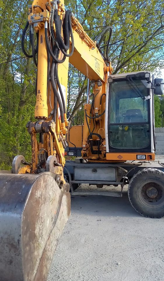 Liebherr A316 - Колёсный экскаватор: фото 2 Liebherr A316 - Колёсный экскаватор: фото 2