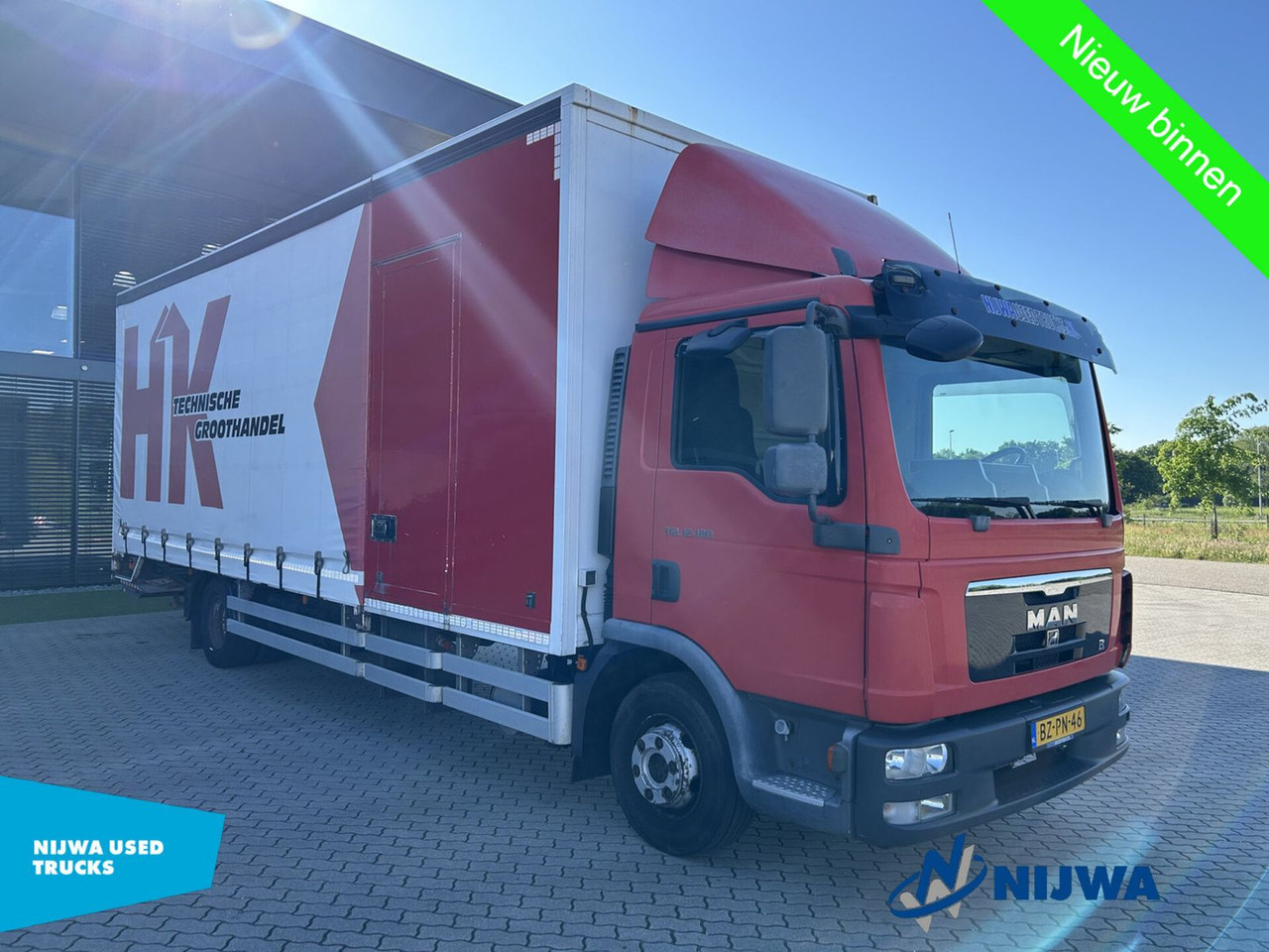 MAN TGL 12.180 4X2 Roldeur + Laaklep - Тентованный грузовик: фото 2 MAN TGL 12.180 4X2 Roldeur + Laaklep - Тентованный грузовик: фото 2
