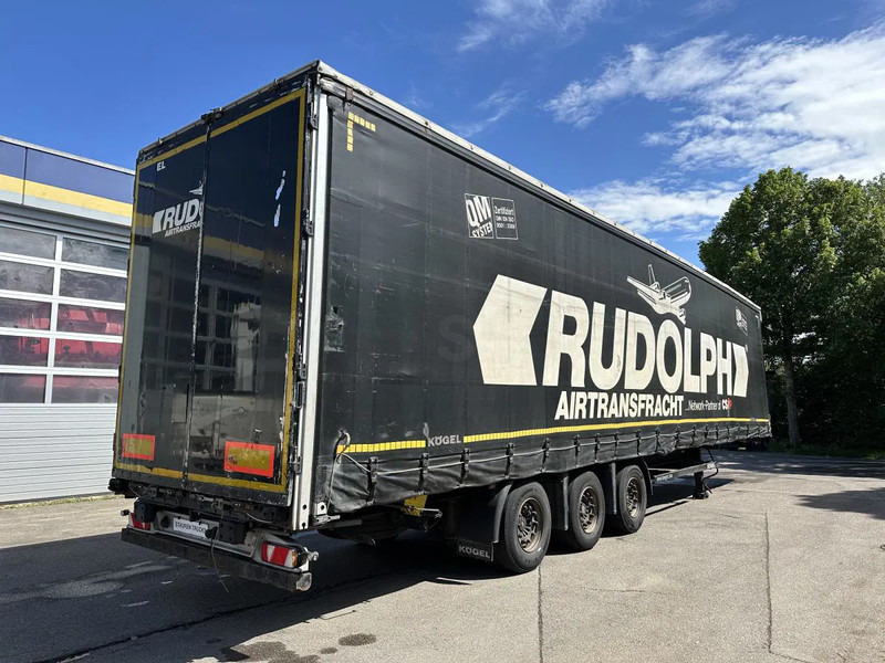 Kögel MEGA Tautliner mit ROLLENBETT Flughafentr. MEGA Tautliner mit ROLLENBETT Flughafentr. - Полуприцеп-фургон: фото 5 Kögel MEGA Tautliner mit ROLLENBETT Flughafentr. MEGA Tautliner mit ROLLENBETT Flughafentr. - Полуприцеп-фургон: фото 5