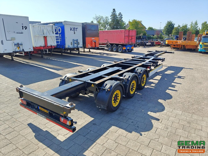 Kögel PORT 40 SIMPLEX 20 3-Assen SAF - Schijfremmen - 20/30/40FT Aansluiting - Achterschuiver - Полуприцеп-контейнеровоз/ Сменный кузов: фото 1 Kögel PORT 40 SIMPLEX 20 3-Assen SAF - Schijfremmen - 20/30/40FT Aansluiting - Achterschuiver - Полуприцеп-контейнеровоз/ Сменный кузов: фото 1