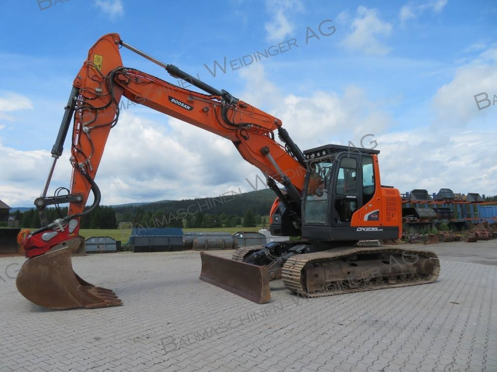 Doosan DX 235 LCR-5 - Гусеничный экскаватор: фото 1 Doosan DX 235 LCR-5 - Гусеничный экскаватор: фото 1
